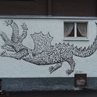 Drache an Hauswand