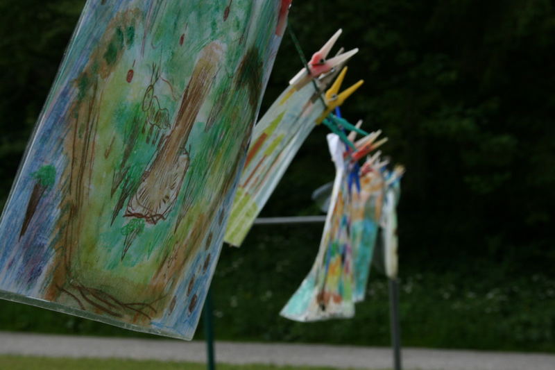 drawings of children against the weather in the alps