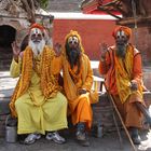 Drei farbenfrohe Sadhu's