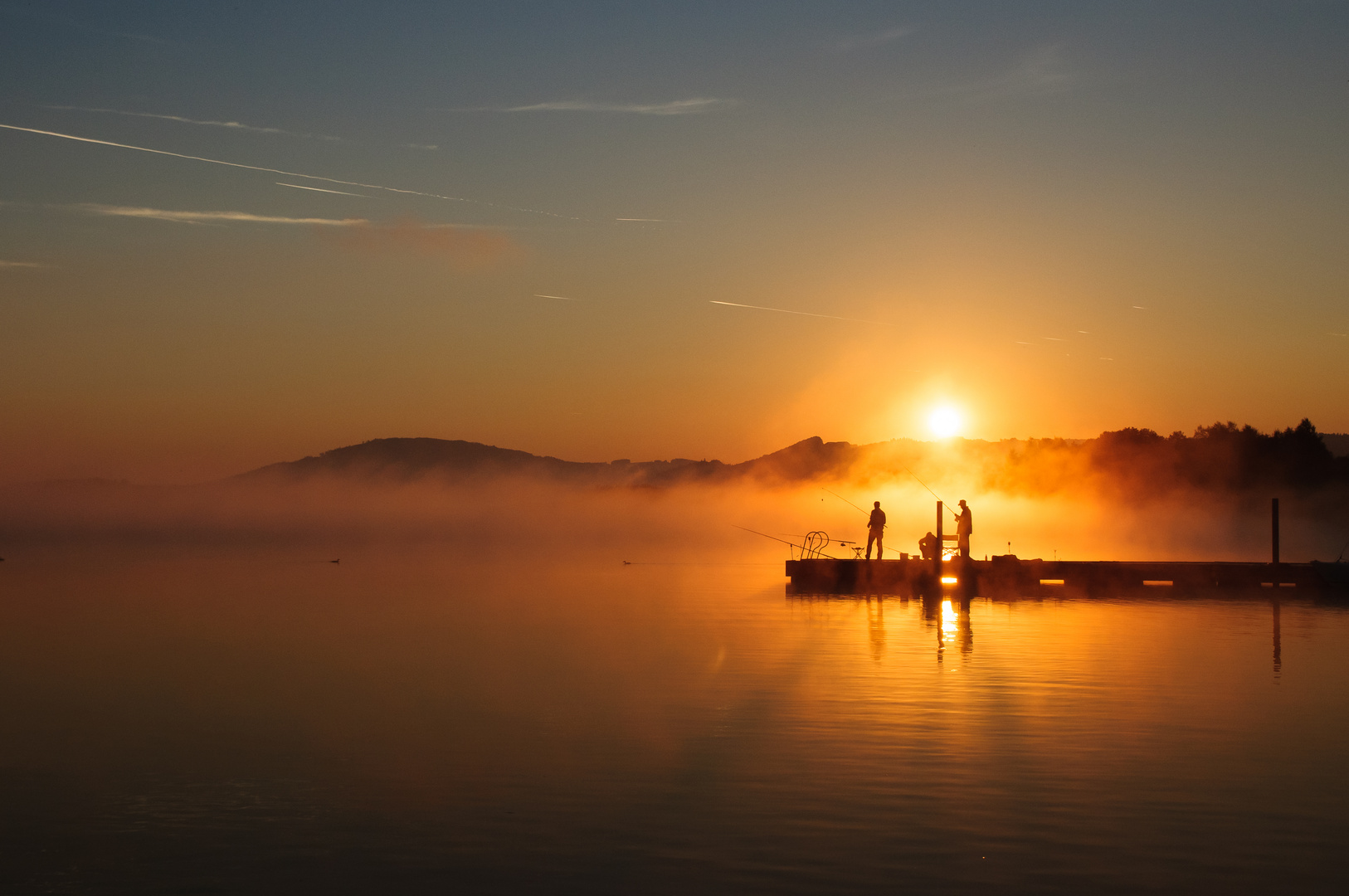 Drei Freunde am See