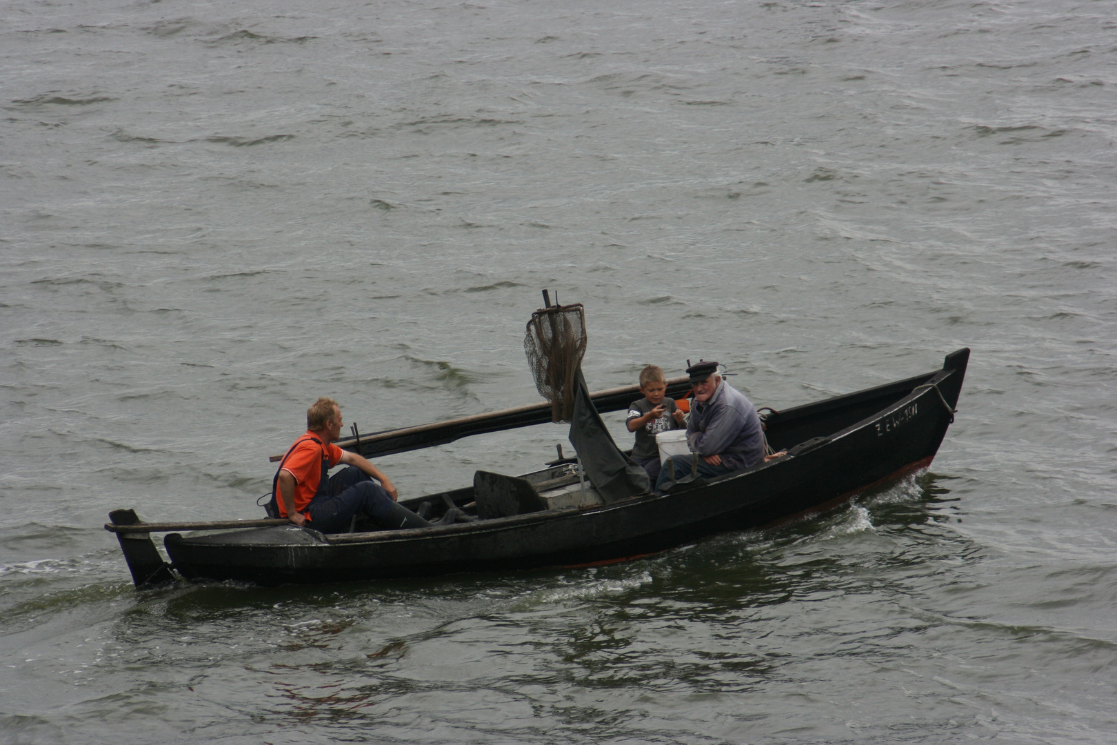 drei Generationen in einem Boot