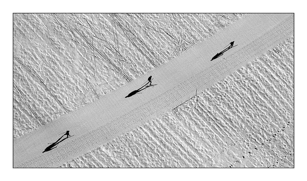 Drei Männer im Schnee