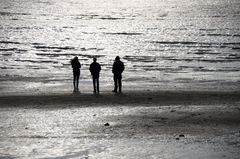 Drei Strandbesucher