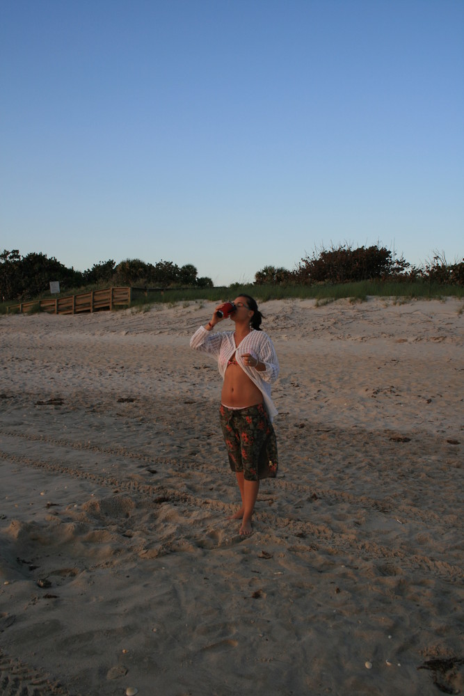 drinking coffee down at the beach at dawn