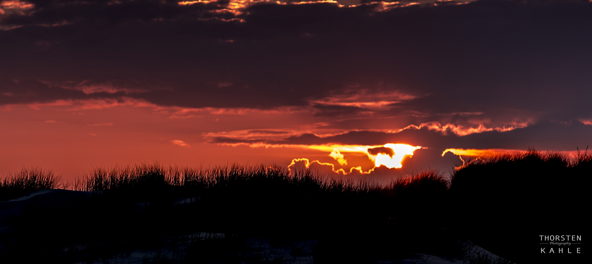 Dühnen und Sonnenuntergang