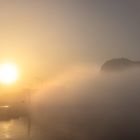 Dunstiger Sonnenaufgang bei Gibraltar