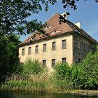 Durchblick zum Wasserschloss Tauchritz