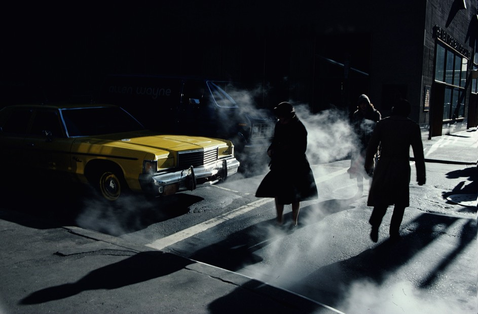 E. Haas - Pedestrians crossing a New York street in winter time cast long shadows, 1980.