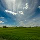 Wolken ber Feldern