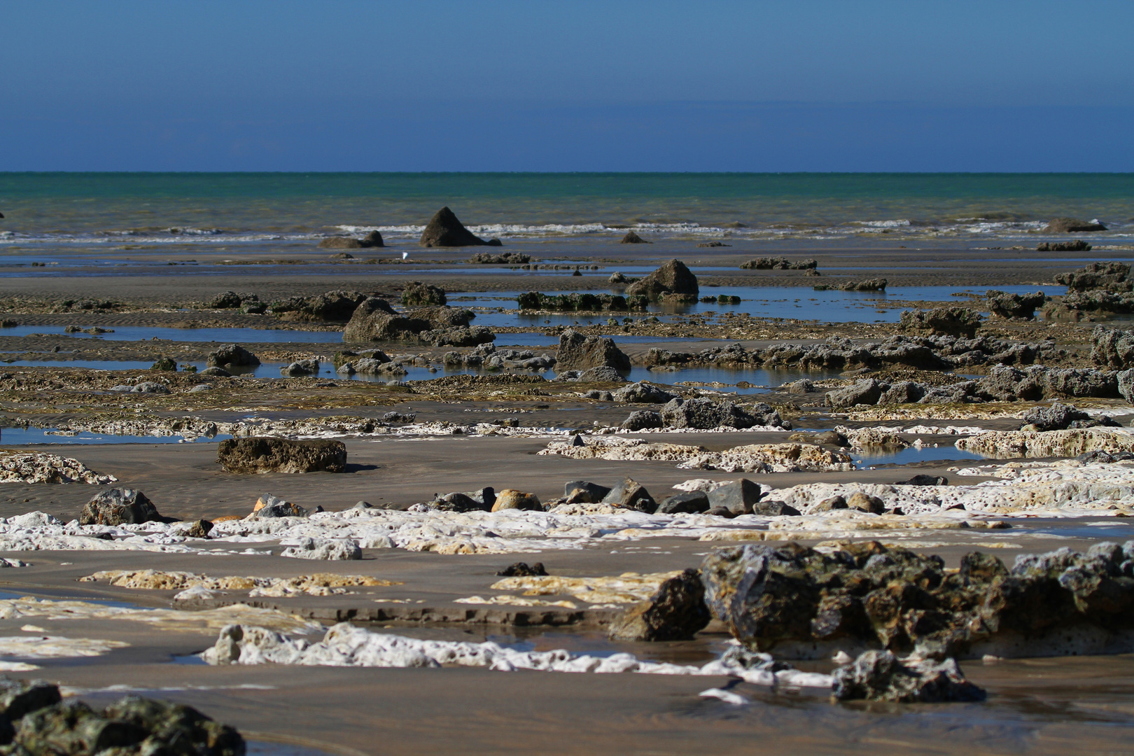 Ebbe am Strand von Sotteville sur Mer