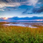 Ebbe und Sonnenuntergang am Evangeline Beach, Nova Scotia Kanada