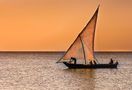 sailboats at sunset by roby burchi
