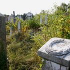 Ehrenkranz auf einem Grabmal auf dem jüdischen Friedhof