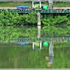 Ein Angler am Weiher