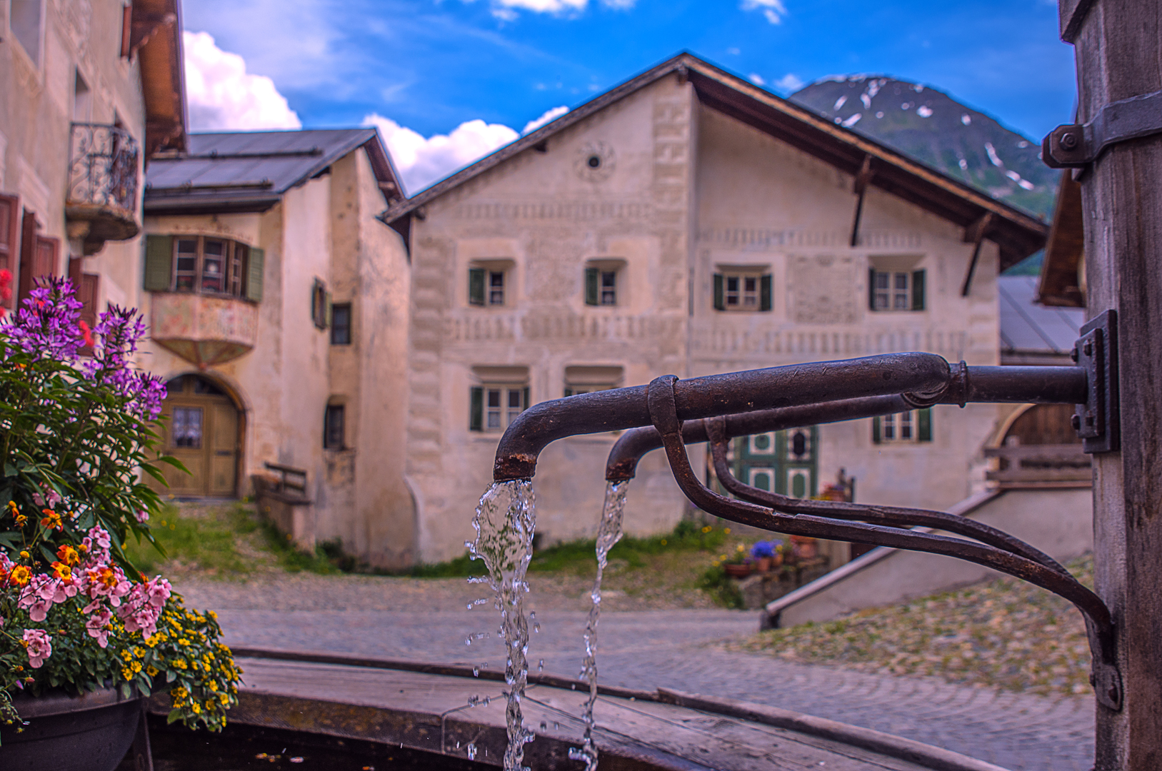 Ein Brunnen in Guarda