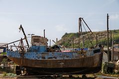 Ein Fischerboot, gezeichnet von Sturm und Wetterkapriolen.