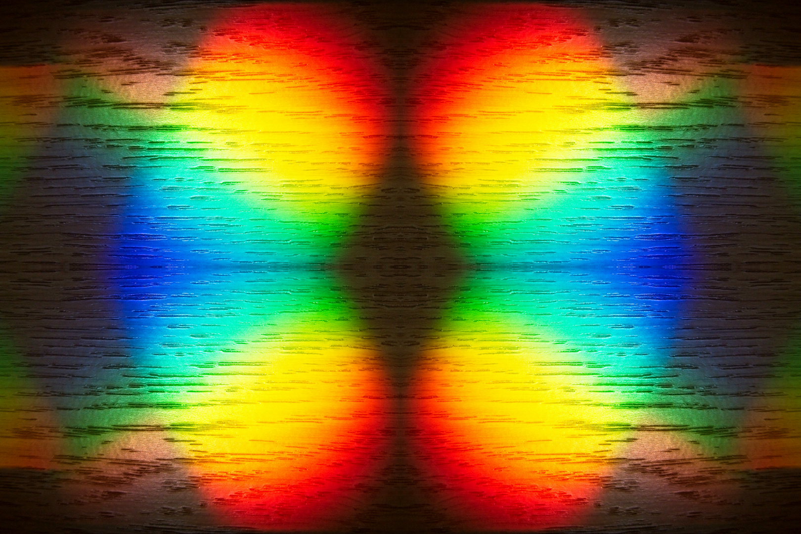 Ein Fleck in Spektralfarben 4fach gespiegelt