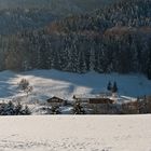 Ein Hof im Schnee