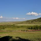 Ein langer Güterzug im Omega Loop bei Xohxop auf dem Weg Richtung Ulaanbaatar.