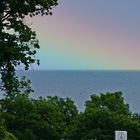 ein Regenbogen auf dem Meer