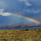 Ein Regenbogen über dem Issyk-Kul-See in Kirgisistan 2015