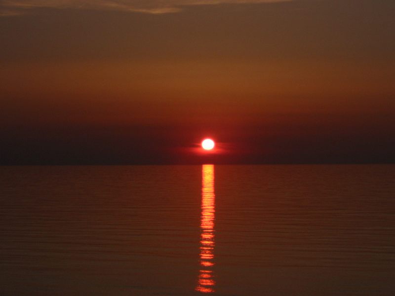 Ein Steichholz verglüht am Abendhimmel