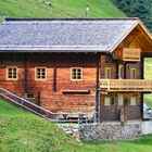 Eine Almhütte der Alfenalm 