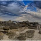 Eine Stein-reiche Küste ... - Une plage riche en pierres ... 