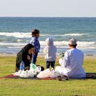 Einen Familientag am Strand