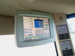 Einer der Monitore im John Deere Mähdrescher HillMaster T 560 i.