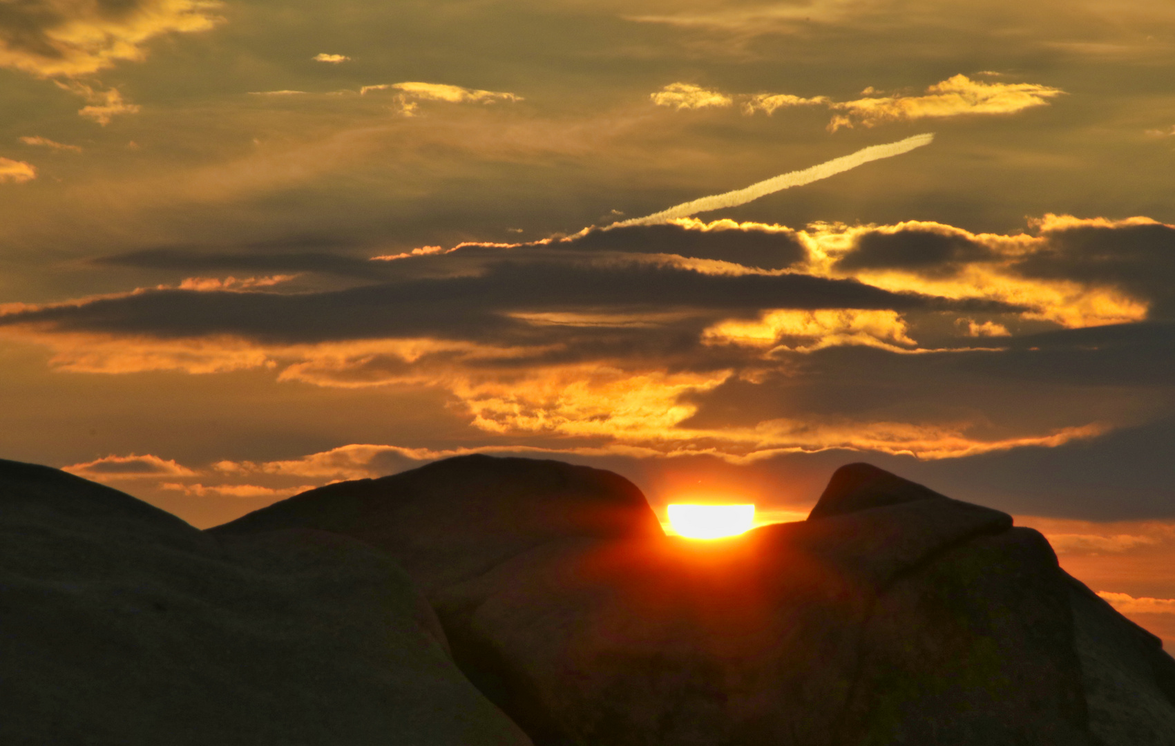 Eingebetteter Sonnenuntergang auf dem Brocken