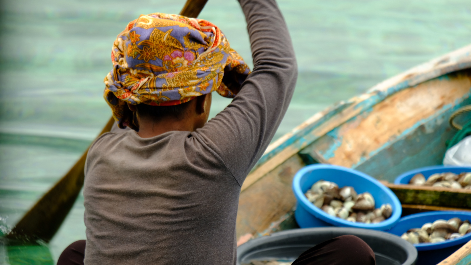 Einheimische auf Mabul Island beim täglichen Geschäft