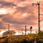 Eisenbahnstrecke mit Stahlbaukonstruktion / Intensive Abendsonne - HDR - Bearbeitet