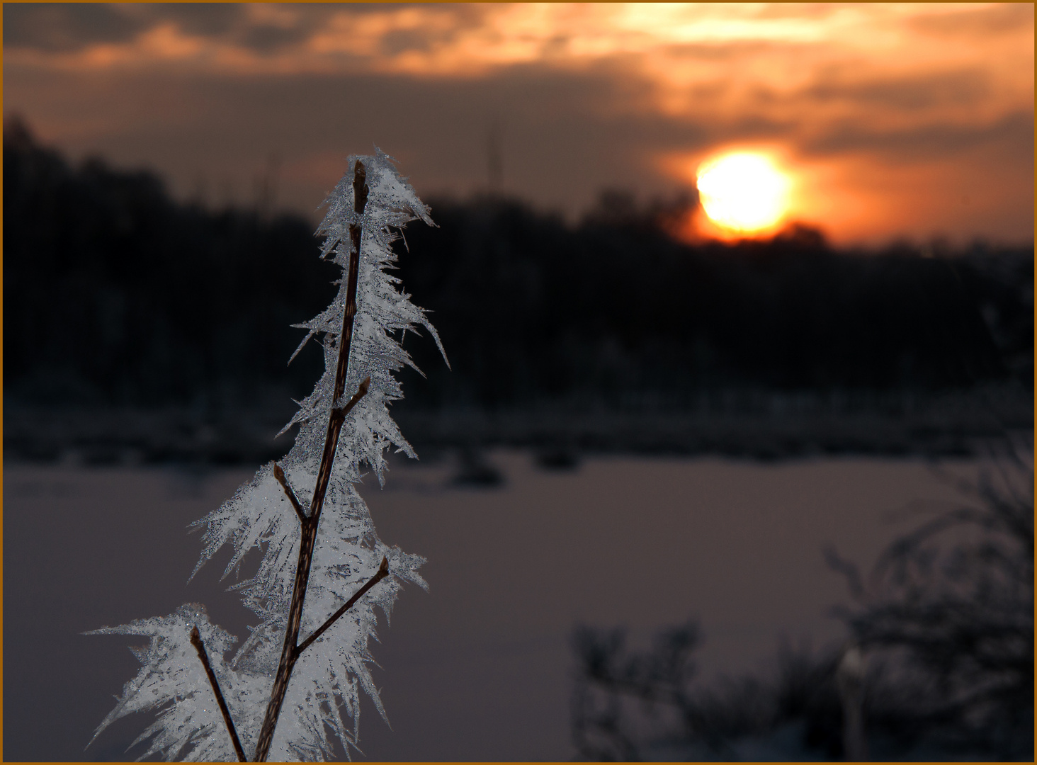 Eiskalter Sonnenuntergang