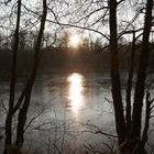 Eiszeit am See bei Sonnenuntergang