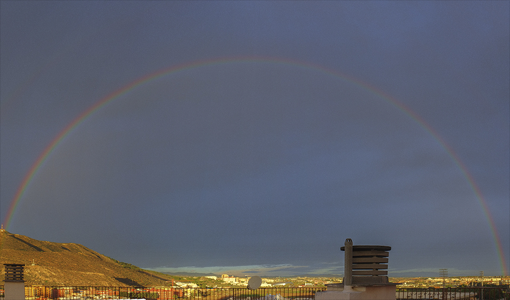 El arco iris en plena tormenta