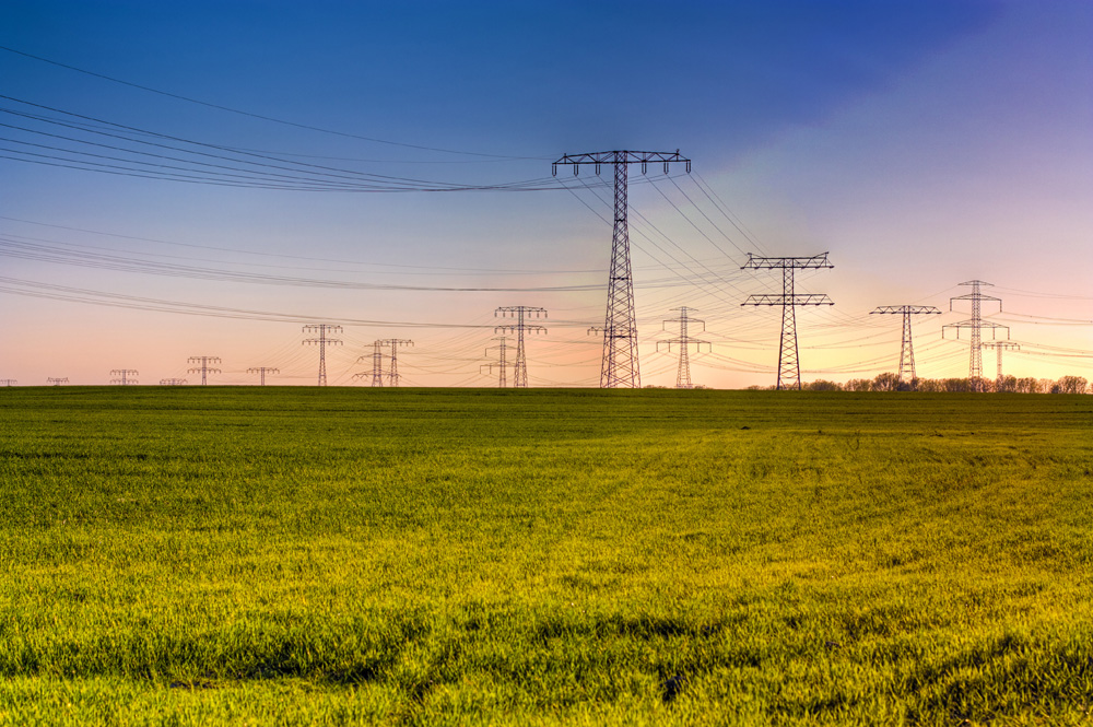 Electrical towers on the field