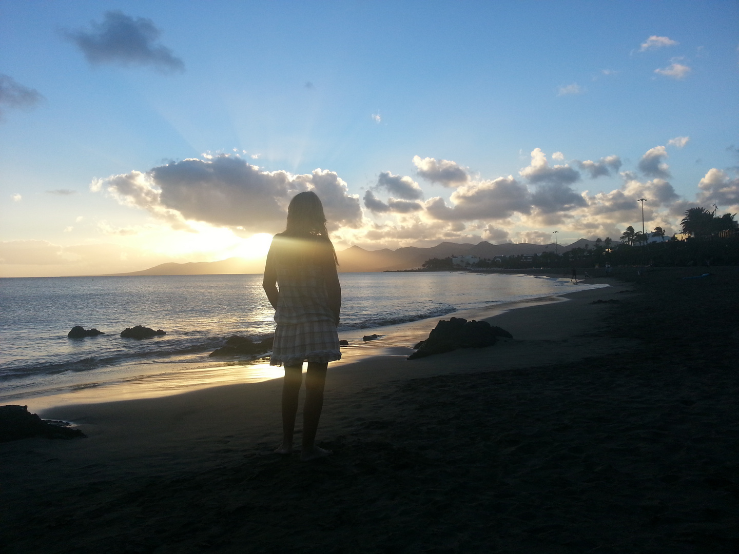 Ella y su atardecer