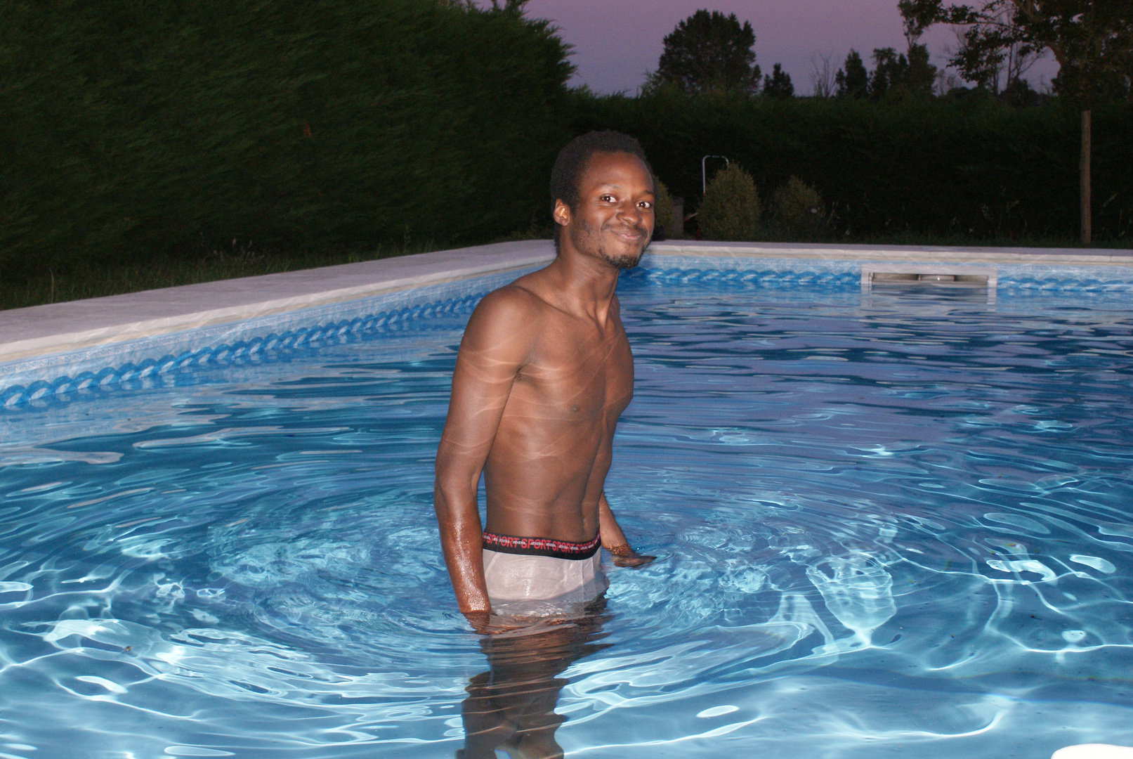 Emmanuel Buriez in private swimming pool