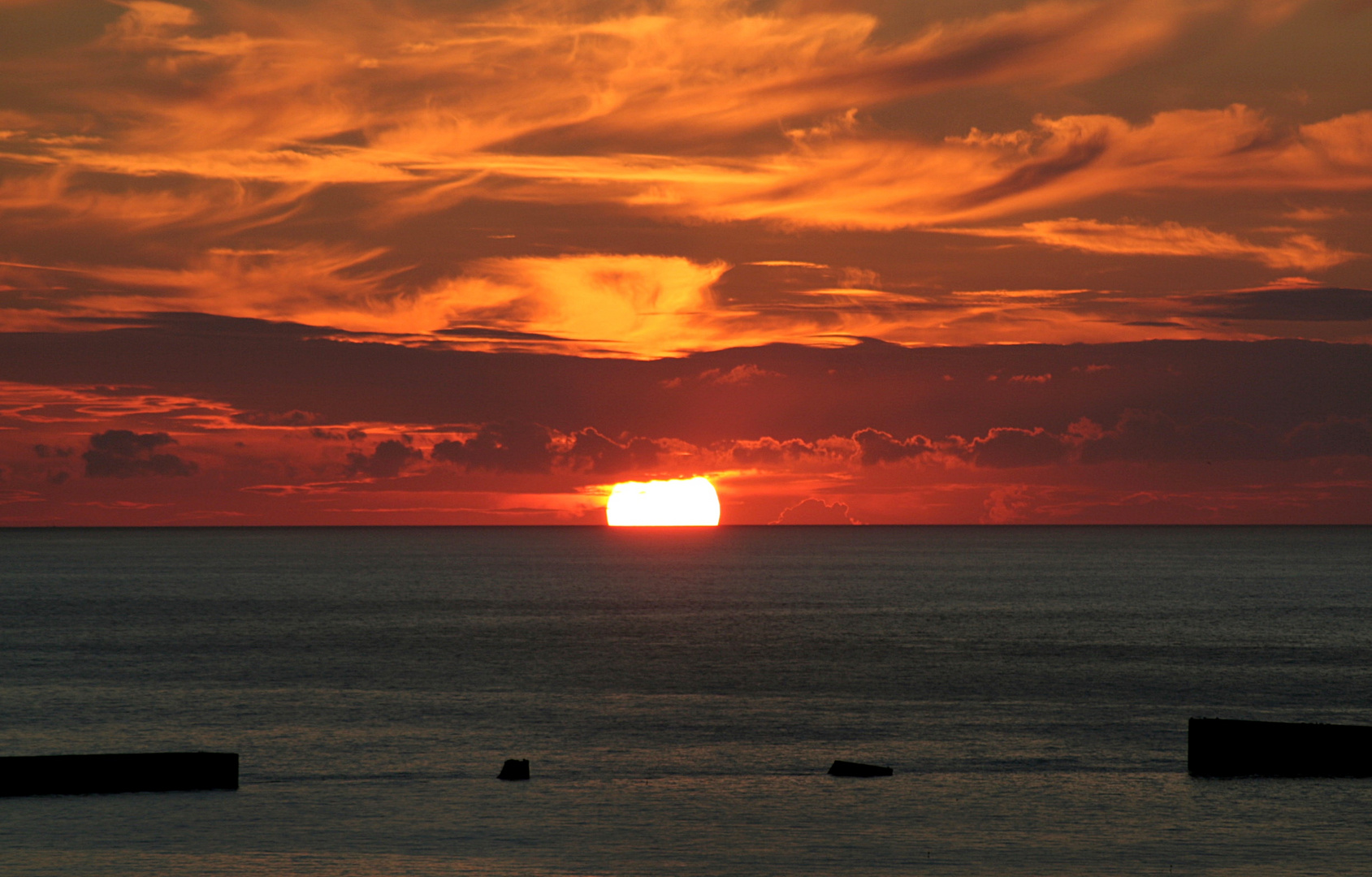 Entre guerre et paix - Coucher de soleil à Arromanches-les-Bains