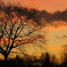 entre soleil couchant et pleine lune