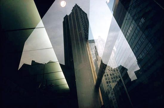 ernst-haas-reflection-revolving-door - 1975