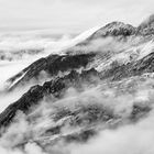 Erster Schnee über den Wolken