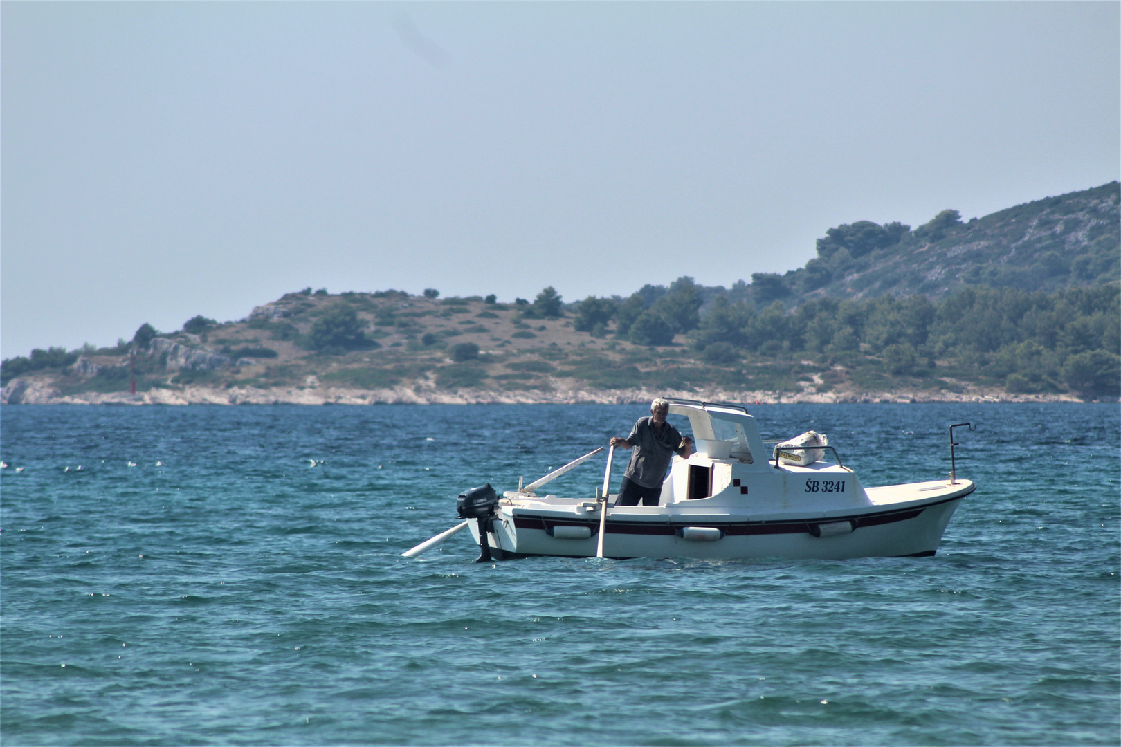 erzählend vom kroatischen  Fischer auf dem Meer