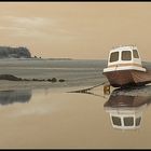 estuary boat reflection