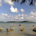 Evening view of Bon Island from Rawai Beach, Phuket, Thailand.