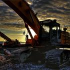 excavator in the evening sun