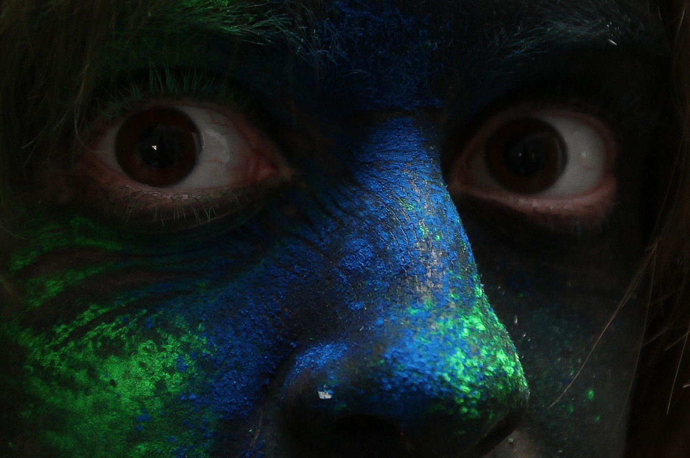 Eyes in black, green and blue