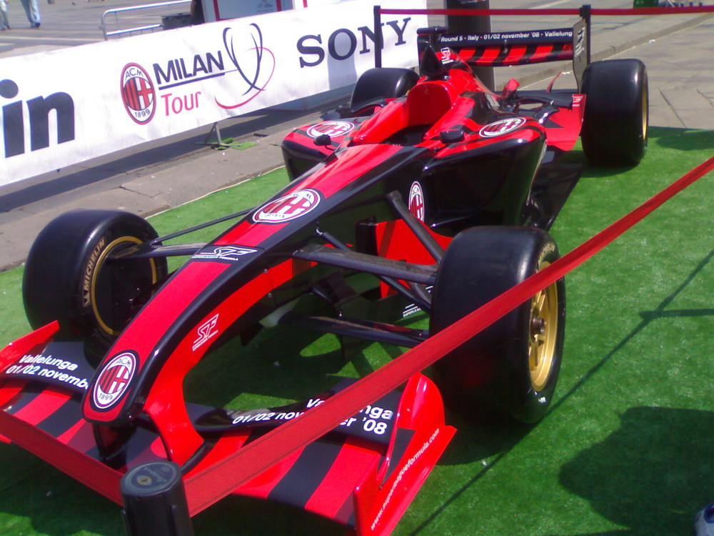 F.1 car of milan football club