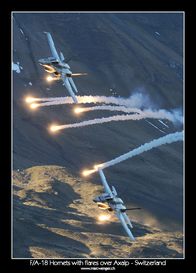 F/A-18 Hornets with flares over Axalp 2010 - Switzerland